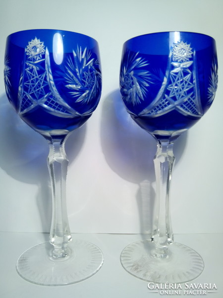 One drop in a pair of polished glasses with crystal bases was damaged