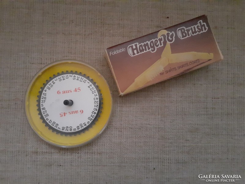 Retro marked ball 45 lottery game of chance with a folding hanger in a box