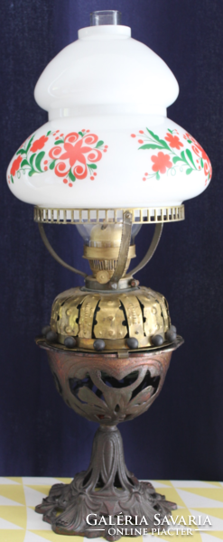 Old table with kerosene lamp