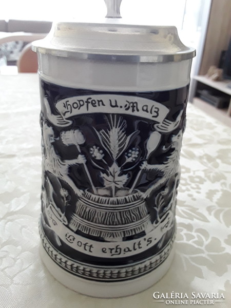 German beer mug with brau-union engraving on top.
