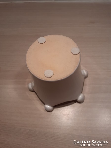 Small pot with crown-shaped white ceramic candlestick