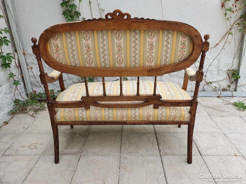 Freshly upholstered antique classicist french sofa