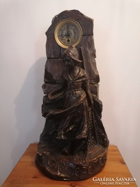 Statue with clock
