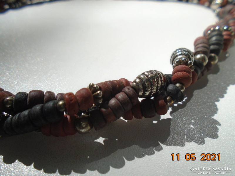 Tribal three-row twisted necklace made of multi-colored sandalwood and silver-colored metal beads