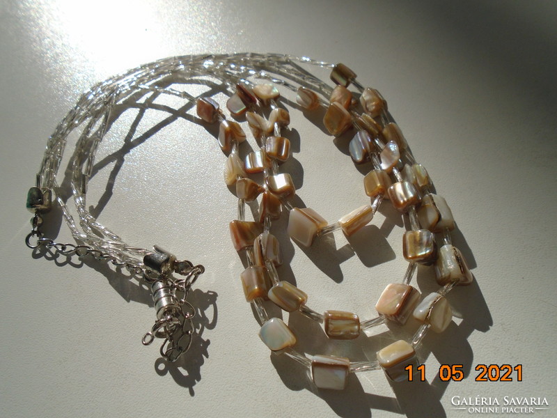 3-row necklace made of polished faceted shell pearls