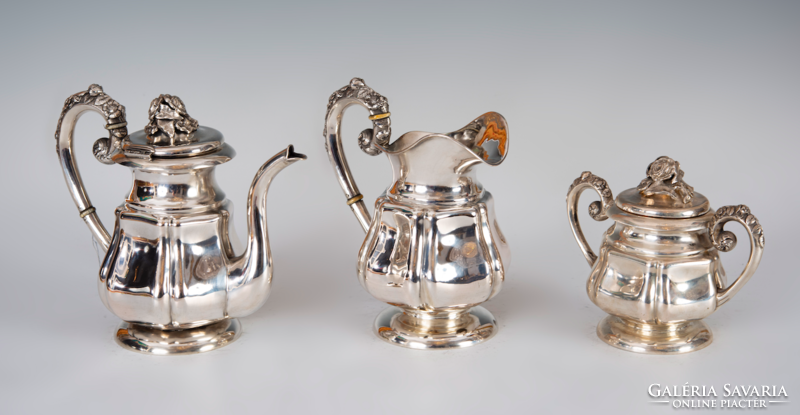 Silver tea set with rose pattern