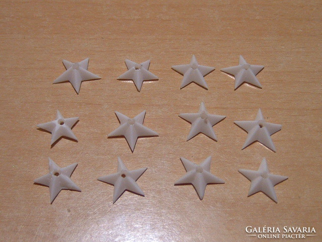 Mn 10 + 2 5-pointed bone stars # + zs