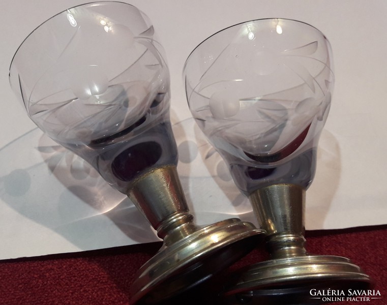2 glasses with metal bases