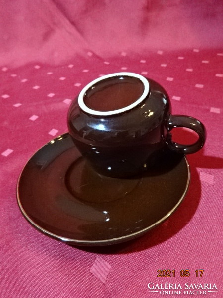 Chocolate brown glazed ceramic, coffee cup with gold border + placemat. He has!