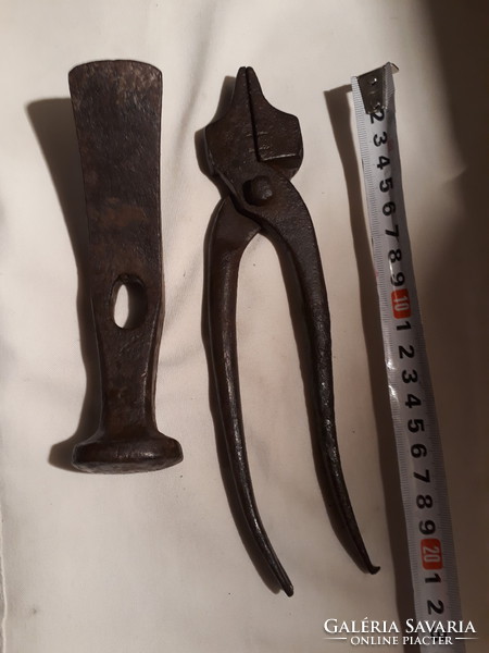 Two old shoemaker's tools (one is a trowel)