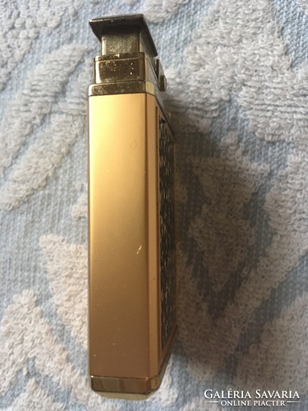 Working royal musical Japanese lighter with a rare pattern
