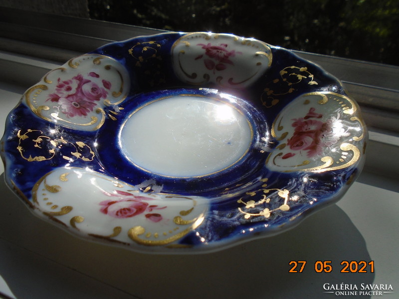 19. Tea set with cobalt gold hand painted rose patterns