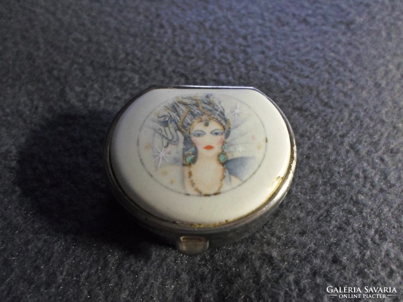 100-year-old art deco metal cup with a hand-painted porcelain portrait on top