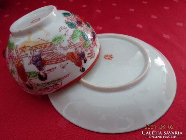 Japanese porcelain teacup + placemat. He has!