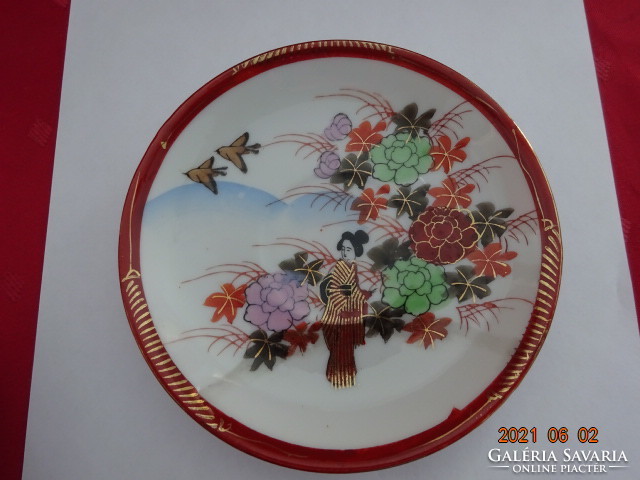 Japanese porcelain teacup coaster, diameter 14 cm. He has!