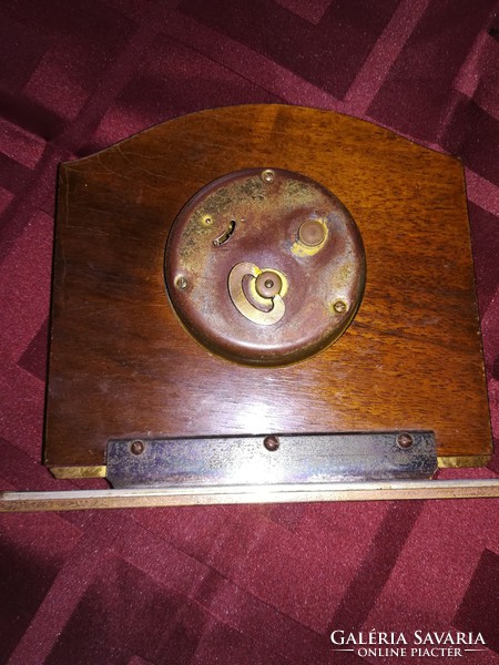 Old table, fireplace clock