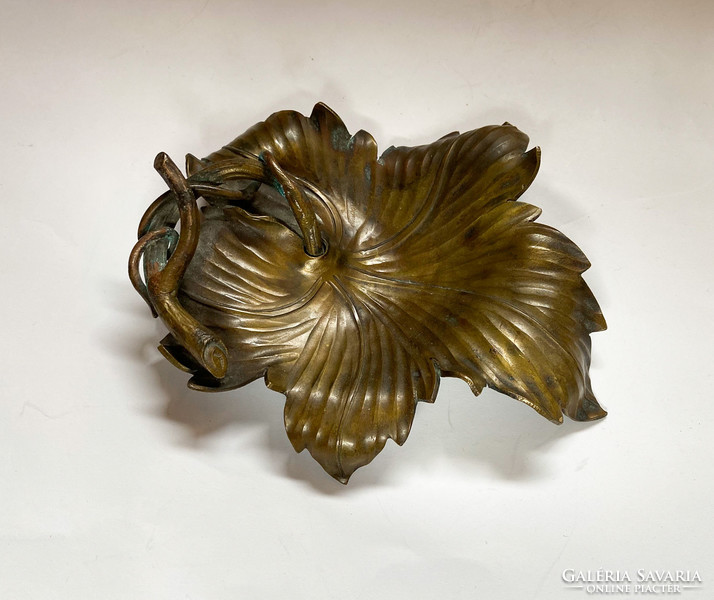 Old handcrafted bronze bowl with grape leaves. 2.