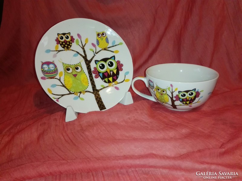 Porcelain tea set with owl pattern.