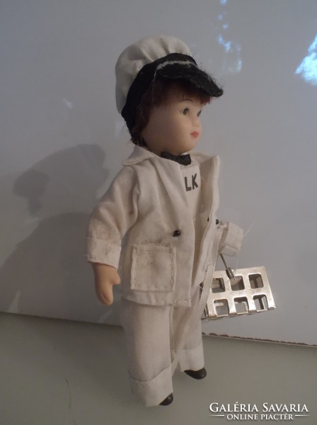 Porcelain doll - milk barrel boy - 14 x 8 cm - hand holding metal compartment - German