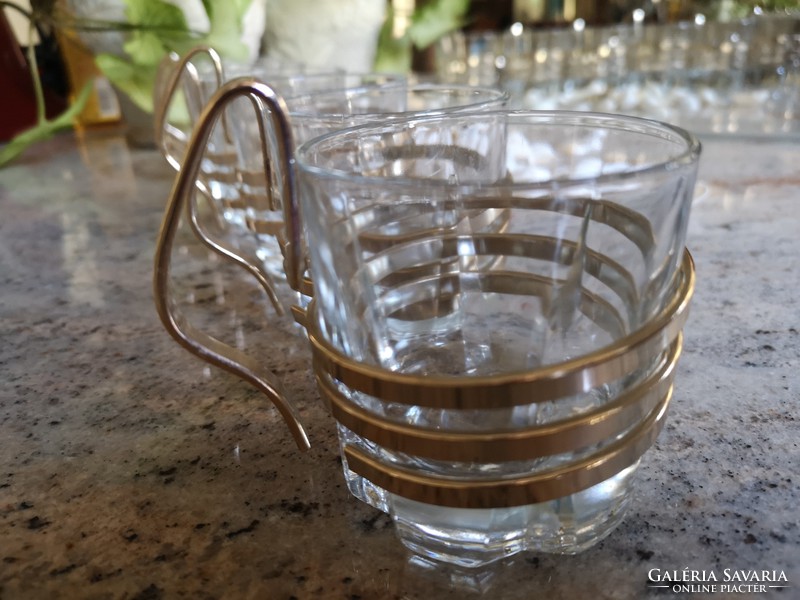 Retro coffee and cappuccino glasses in an aluminum spiral holder