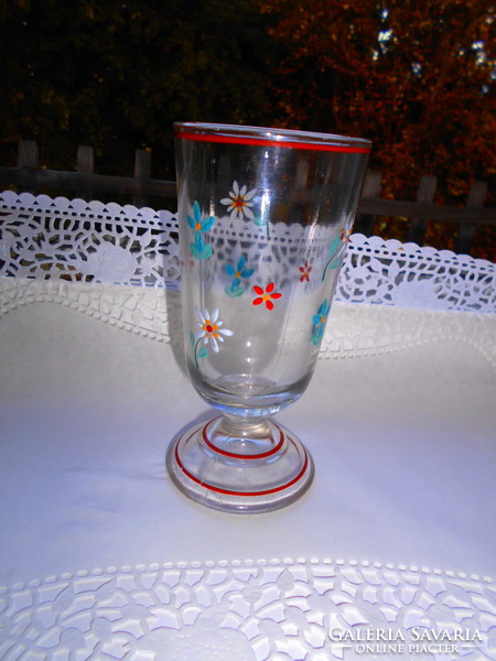 Glass cup with thick-walled base with enamel-painted flower pattern