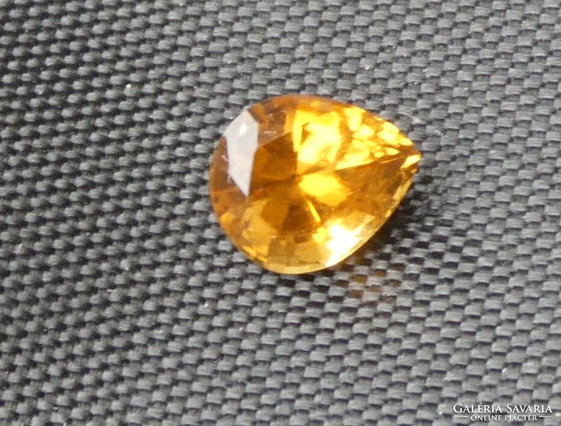 Natural yellow-brown tourmaline mineral polished gemstone. 0.83 Ct
