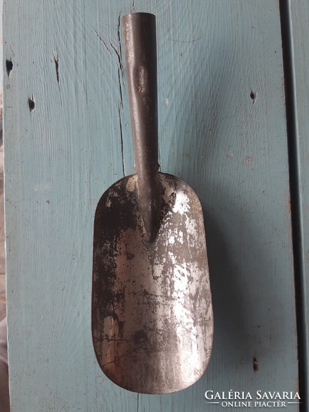 Metal grocery spoon