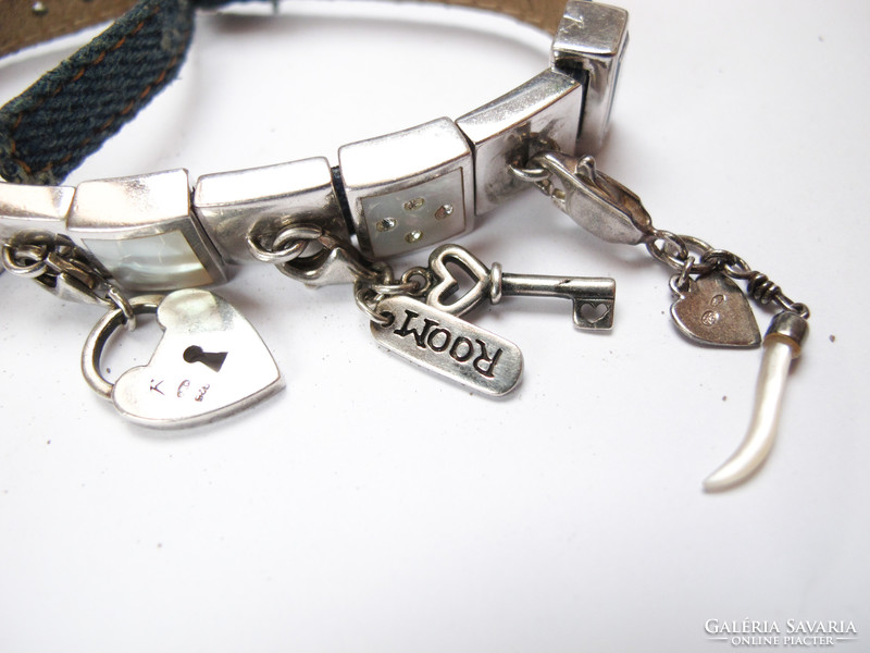 Bracelet with silver charms.