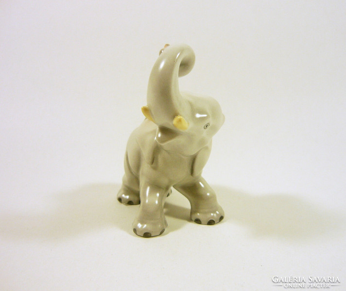 Herend, elephant with raised handle 8.5 Cm hand-painted porcelain figurine, flawless! (P093)