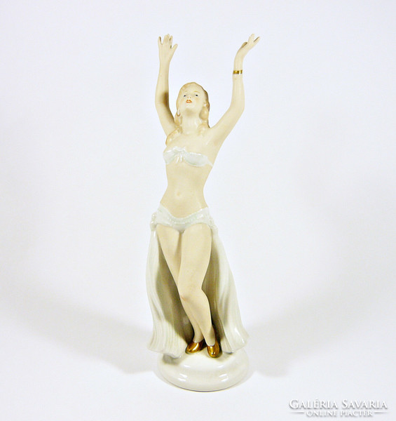 Wallendorf, a charming diva posing with a hand-painted porcelain figurine, is flawless! (P199)