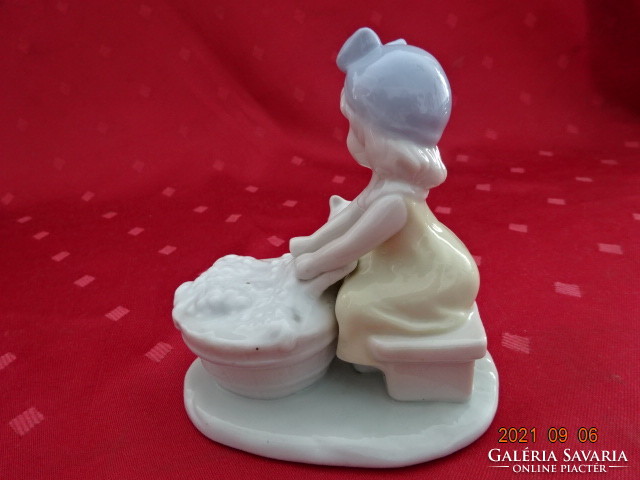 German porcelain figurine, little girl with kitten, little girl washes in the tank. He has!