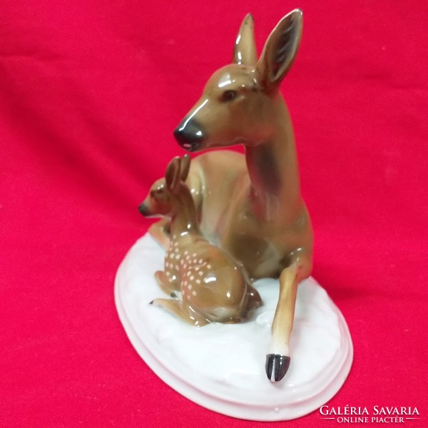 German, German fasold & stauch bock wallendorf porcelain figurine with deer kid lying.