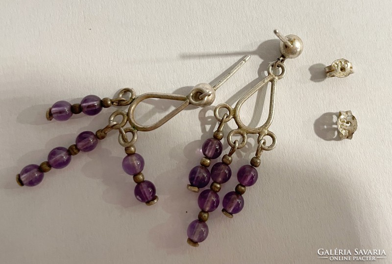 Pretty silver earrings with purple stones