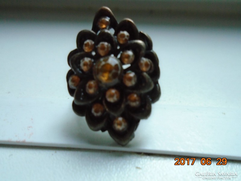 Antique goldsmith's work, polished stone ring with rosette on it