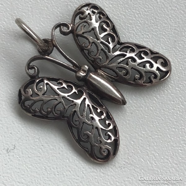 Old butterfly pendant with openwork decoration