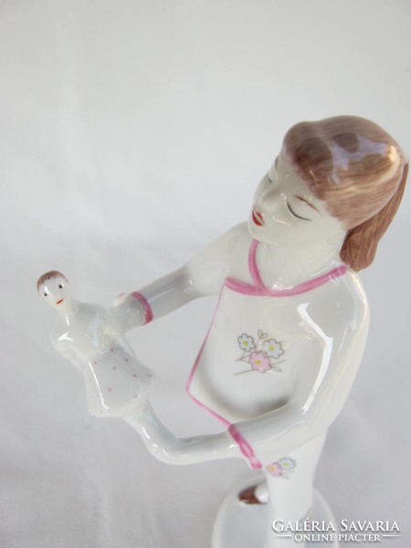 Retro ... Raven house porcelain figurine little girl playing with nipple doll