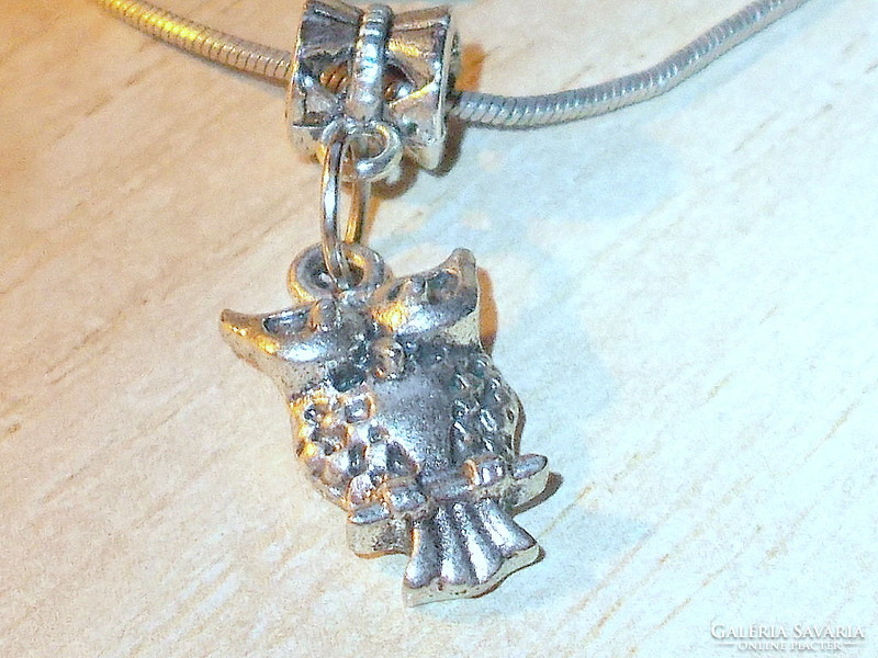 Antique owl with Tibetan silver necklace with ornate hanger