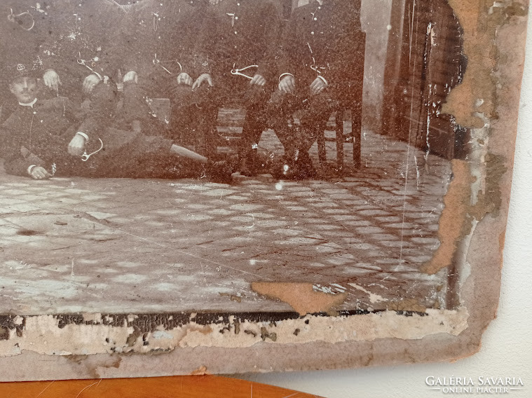 Damaged large photo of an antique Hungarian firefighter depicting firefighters