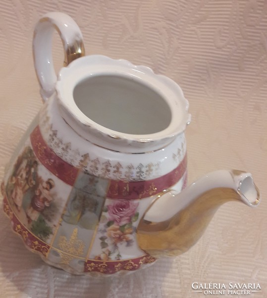 Romantic scene with antique porcelain teapot