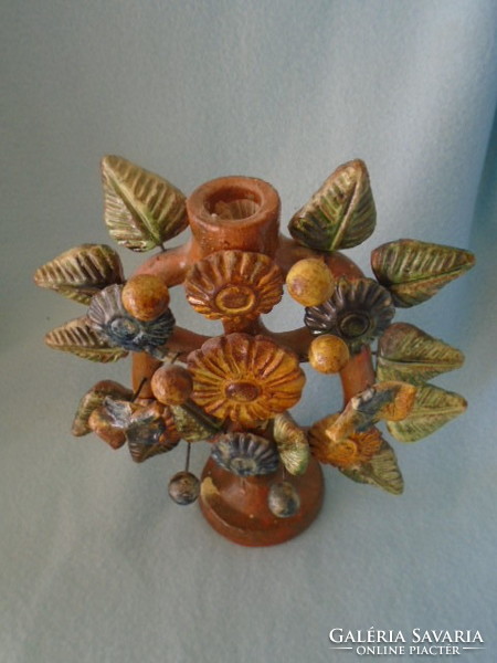 Very antique terracotta artistic candle holder with dimensions of 23 x 22 cm