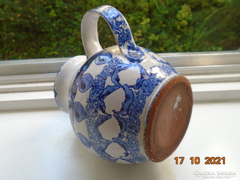 Lead glazed hand painted blue and white ceramic jug