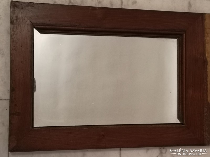 Antique wall mirror incomplete.
