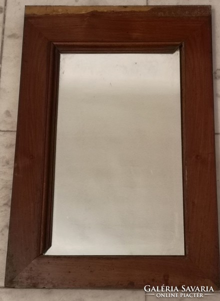 Antique wall mirror incomplete.