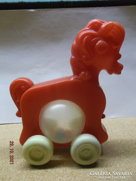 Old children's toy - pullable plastic horse --- 1 ---