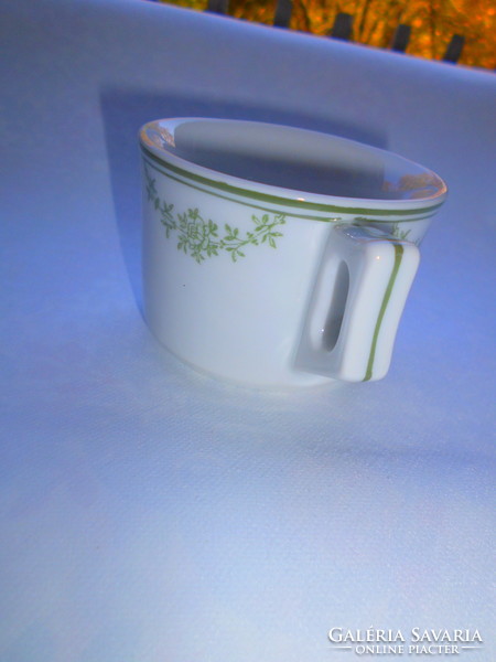 Thick, heavy porcelain cup in cafe