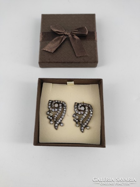 Silver earrings with stones in a gift box