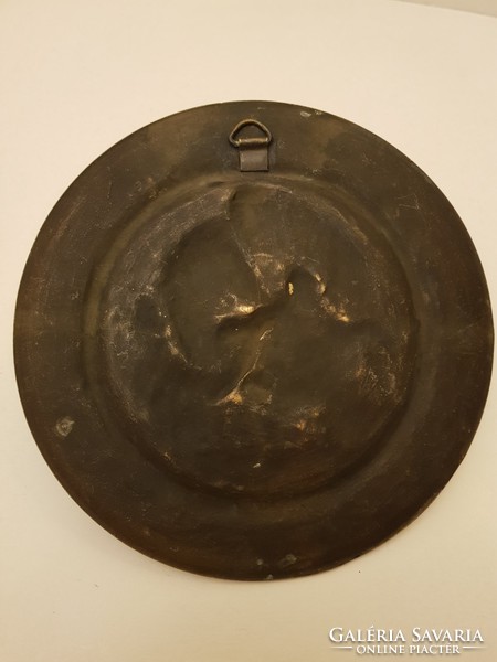 Antique bronze decorative plate.