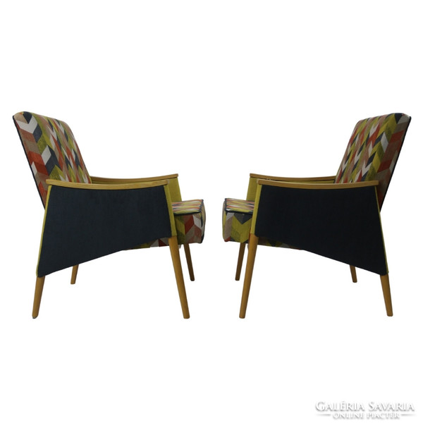 A pair of refurbished retro armchairs with a Scandinavian feel