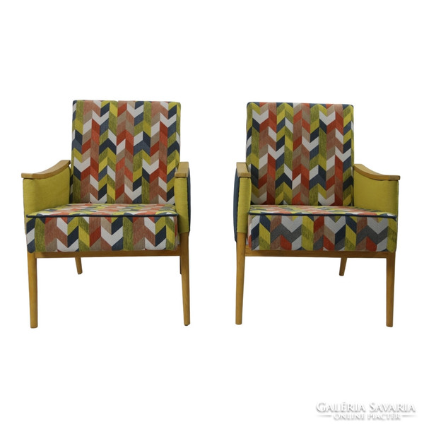 A pair of refurbished retro armchairs with a Scandinavian feel