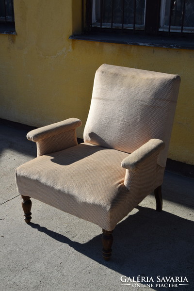 Armchair with wooden turned legs
